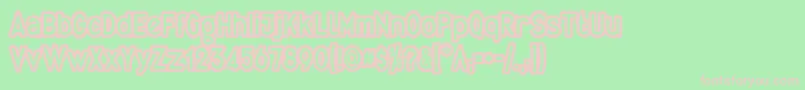 QuirkusOut-fontti – vaaleanpunaiset fontit vihreällä taustalla