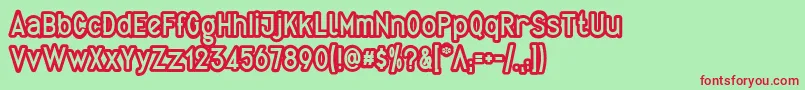 QuirkusOut Font – Red Fonts on Green Background