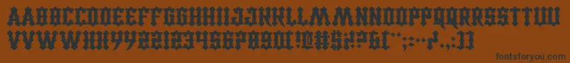 Lisätietoja CarnivalTrash-fontista CarnivalTrash-fontti – mustat fontit ruskealla taustalla