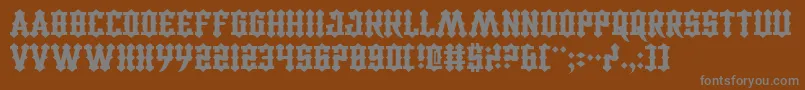 CarnivalTrash Font – Gray Fonts on Brown Background