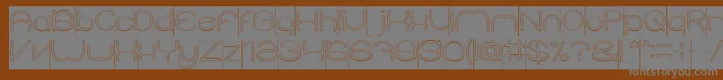 Czcionka ElementaryHollowInverse – szare czcionki na brązowym tle