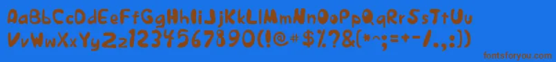 JapestylePlain-fontti – ruskeat fontit sinisellä taustalla