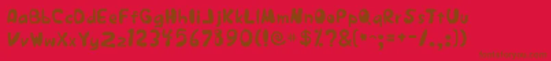 JapestylePlain-fontti – ruskeat fontit punaisella taustalla
