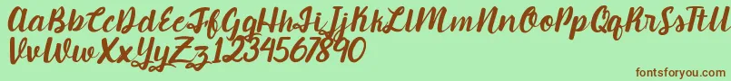 Candlelight Font – Brown Fonts on Green Background