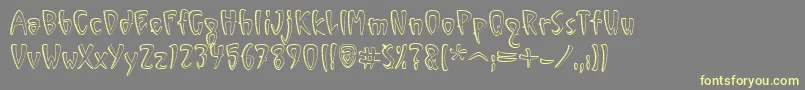 VinylSawtoothOutlineItcTt Font – Yellow Fonts on Gray Background