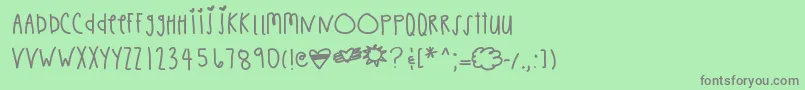 フォントChaishand – 緑の背景に灰色の文字