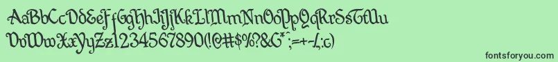 フォントQuillswordrotate – 緑の背景に黒い文字