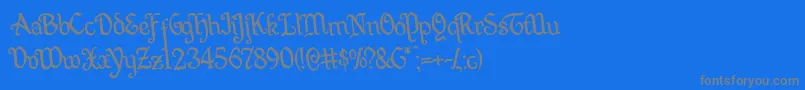 Quillswordrotate-Schriftart – Graue Schriften auf blauem Hintergrund