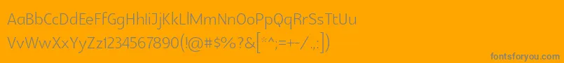 Glametrixlight-Schriftart – Graue Schriften auf orangefarbenem Hintergrund