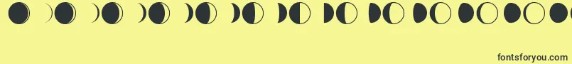 Fonte MoonPhases – fontes pretas em um fundo amarelo