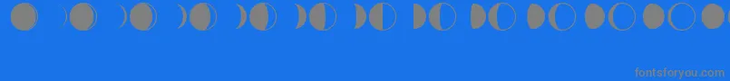 フォントMoonPhases – 青い背景に灰色の文字