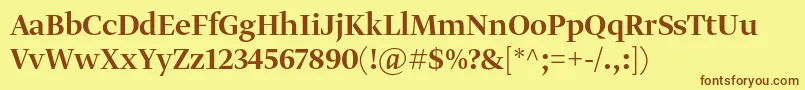 GretadisplayproMedium Font – Brown Fonts on Yellow Background