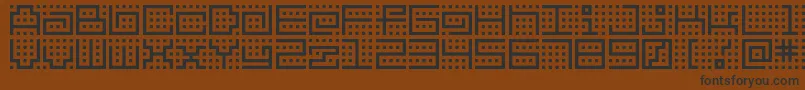フォントBmkitchen – 黒い文字が茶色の背景にあります