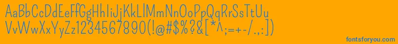 Czcionka PompiereRegular – niebieskie czcionki na pomarańczowym tle