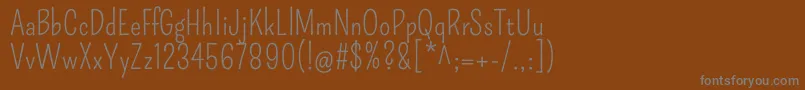PompiereRegular-Schriftart – Graue Schriften auf braunem Hintergrund