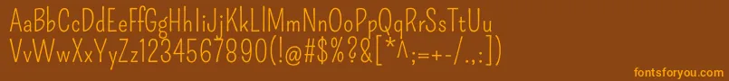 PompiereRegular Font – Orange Fonts on Brown Background
