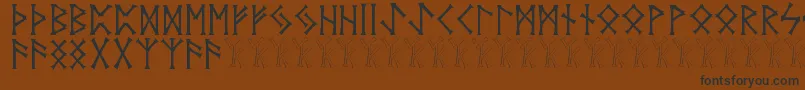 Vidnorse-Schriftart – Schwarze Schriften auf braunem Hintergrund