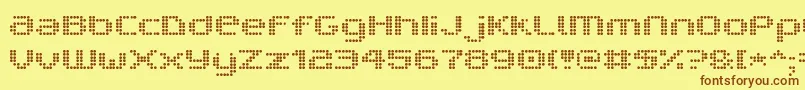 フォントV5ProphitDot – 茶色の文字が黄色の背景にあります。