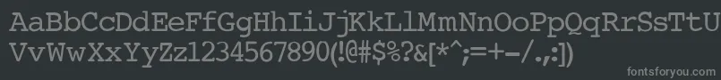 Fonte CourierNormal – fontes cinzas em um fundo preto