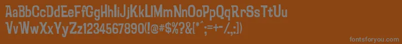 フォントPsychatronic – 茶色の背景に灰色の文字