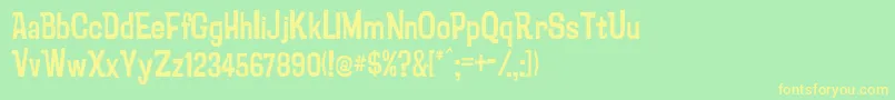 フォントPsychatronic – 黄色の文字が緑の背景にあります
