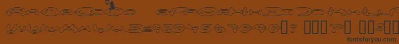 フォントAlieo – 黒い文字が茶色の背景にあります