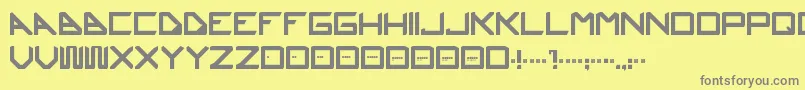 Ustura-fontti – harmaat kirjasimet keltaisella taustalla