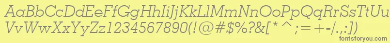 フォントGeo703li – 黄色の背景に灰色の文字