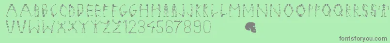 フォントTangomacabre – 緑の背景に灰色の文字