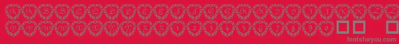 101 Heart Framed-Schriftart – Graue Schriften auf rotem Hintergrund