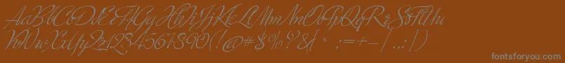 fuente MinistryScript – Fuentes Grises Sobre Fondo Marrón