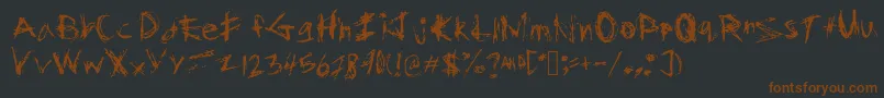 Ghostchase Font – Brown Fonts on Black Background