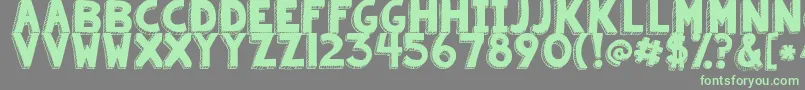 Kgsummersunshineblackout-Schriftart – Grüne Schriften auf grauem Hintergrund
