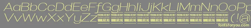 SpecifypersonalExplightitalic Font – Yellow Fonts on Gray Background