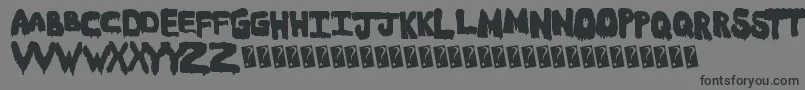 Meltasstic Font – Black Fonts on Gray Background