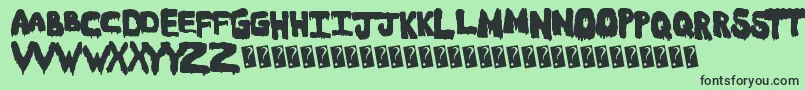 Meltasstic-Schriftart – Schwarze Schriften auf grünem Hintergrund