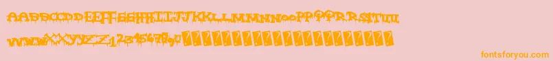 Freakynight-fontti – oranssit fontit vaaleanpunaisella taustalla