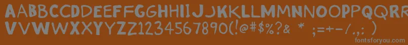 フォントStink – 茶色の背景に灰色の文字