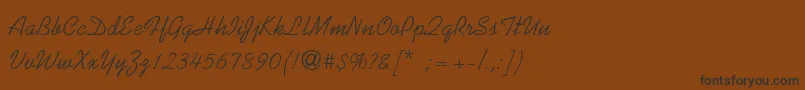 KaufmannThin-Schriftart – Schwarze Schriften auf braunem Hintergrund