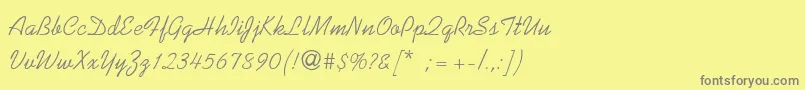 フォントKaufmannThin – 黄色の背景に灰色の文字