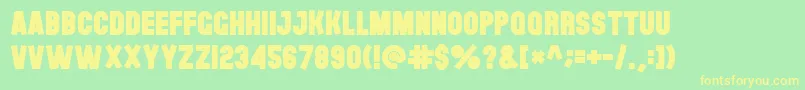 Theblackfont Font – Yellow Fonts on Green Background