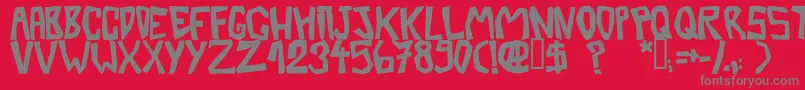BarberatwistedOpaque-fontti – harmaat kirjasimet punaisella taustalla