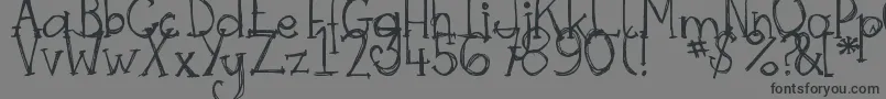DjbSkritchSkratch-Schriftart – Schwarze Schriften auf grauem Hintergrund