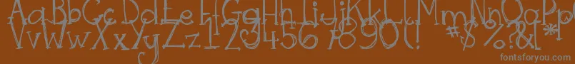 DjbSkritchSkratch Font – Gray Fonts on Brown Background
