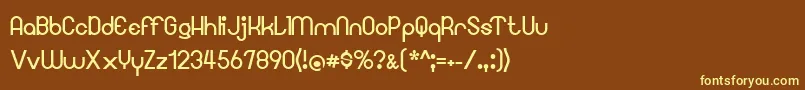 Googee-fontti – keltaiset fontit ruskealla taustalla