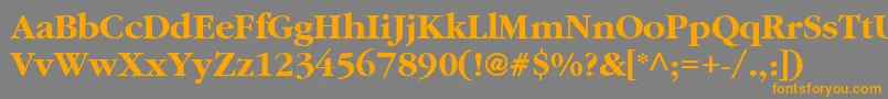 フォントAggaramondCyrBold – オレンジの文字は灰色の背景にあります。