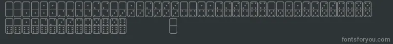 フォントDominosSt – 黒い背景に灰色の文字