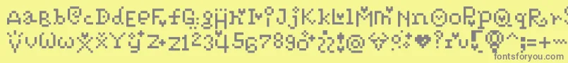 Pixelpoiiz-fontti – harmaat kirjasimet keltaisella taustalla