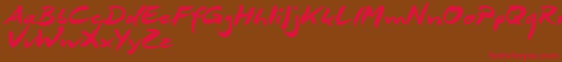 DeborstelBrushReduced Font – Red Fonts on Brown Background