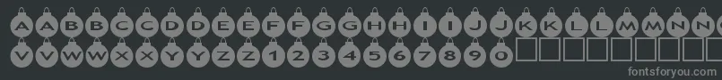 フォントAsxmasballs – 黒い背景に灰色の文字